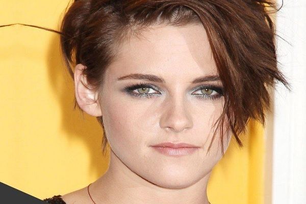 Corte de pelo en la mujer según tu cara - Mujer de cara diamante con un corte de cabello de flequillos, el cual ayuda a equilibrar el rostro y destacar su belleza